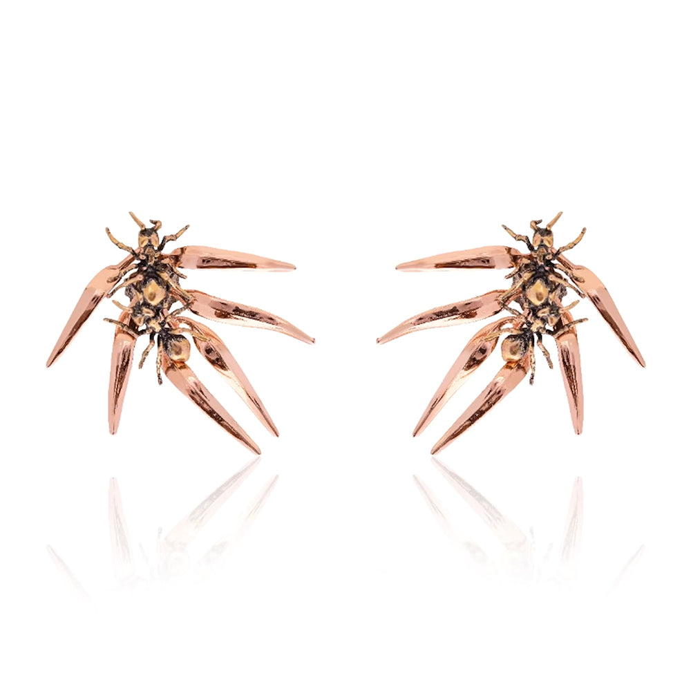 
                  
                    Pendientes hormigas doble Dalí x Suma Cruz
                  
                
