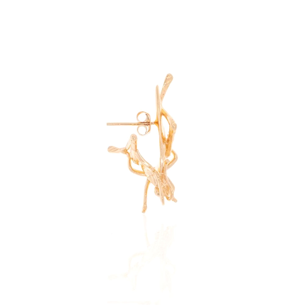 
                  
                    Dalí x Suma Cruz cricket earring
                  
                
