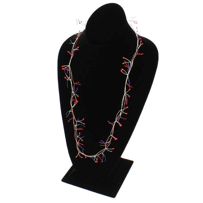 Collar triple pistilo rojo y morado nolde x Luz Moreno