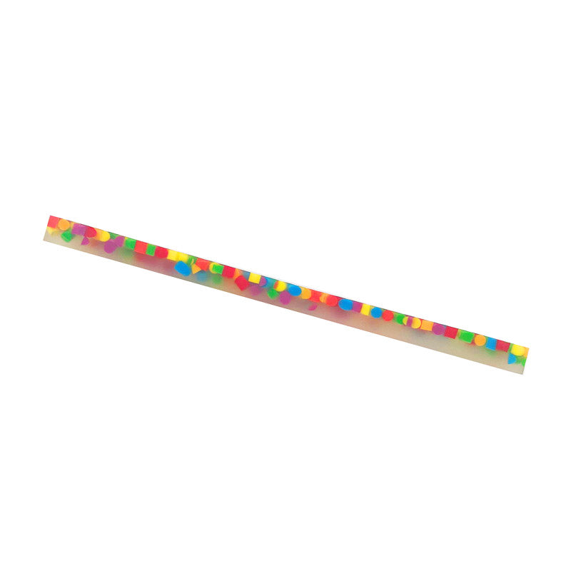 Elongated eraser colored particles